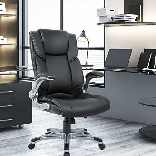 Black leather office chair in modern workspace