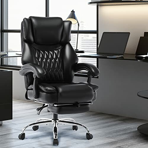 Black leather office chair in a modern office setting