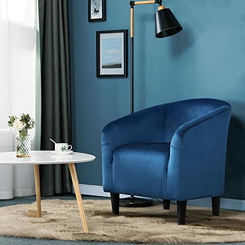 Yaheetech Club Chair in a modern living room with a lamp and table.